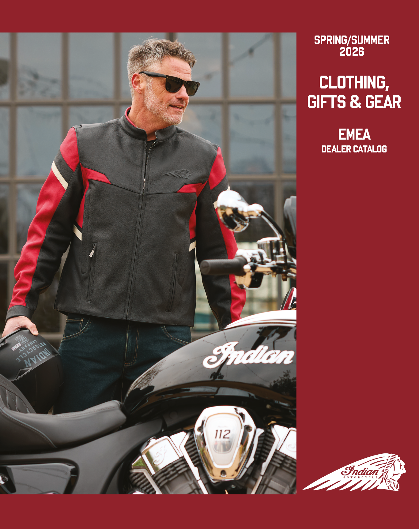 A man wearing a leather jacket and sunglasses is standing next to a motorcycle. AI generated content